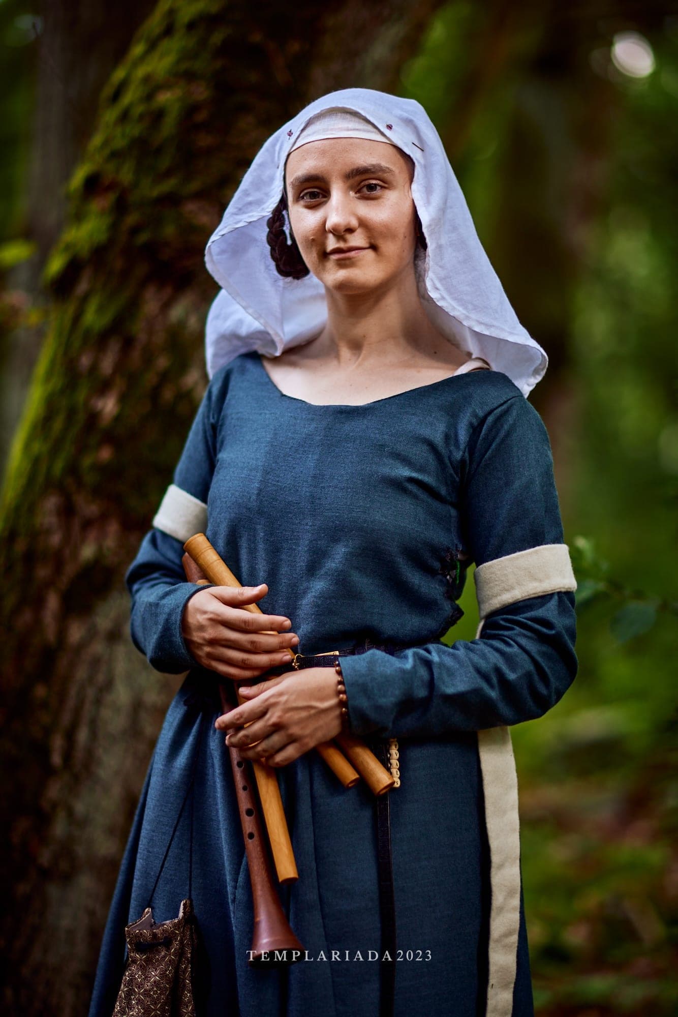 Musician with medieval recorders in period dress